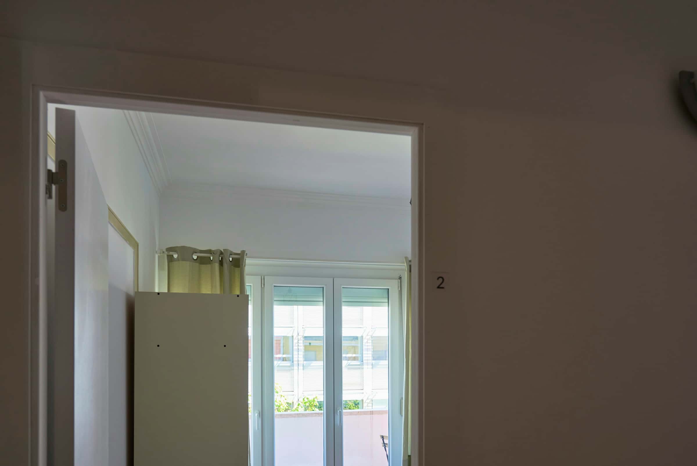 Bedroom in a 7-bedroom apartment in R. Pedro Nunes, Lisbon - Room 2