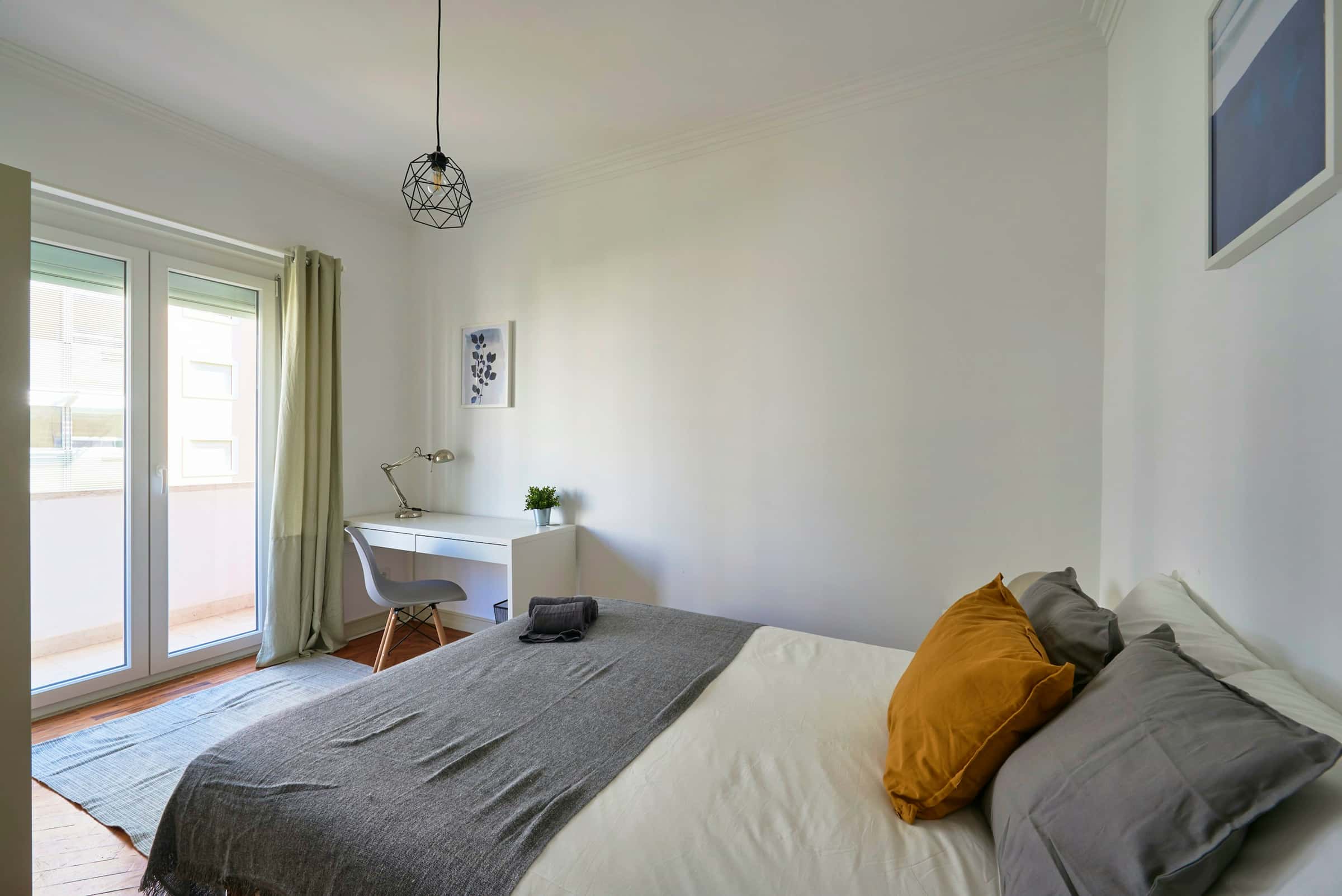 Bedroom in a 7-bedroom apartment in R. Pedro Nunes, Lisbon - Room 1