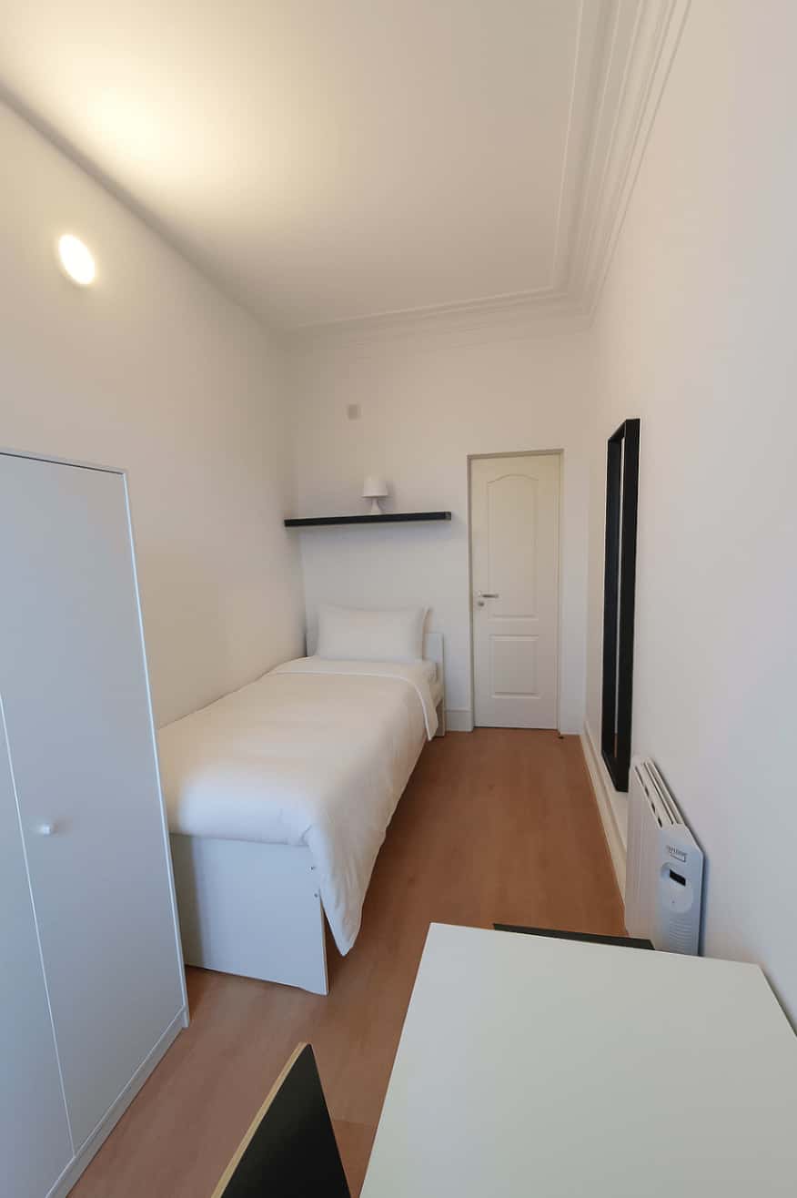 Quarto com cama de solteiro em apartamento com 7 quartos - FLAT W - W3