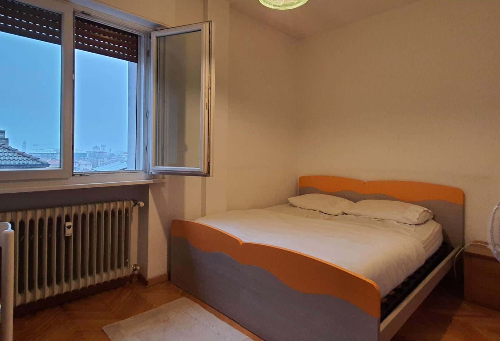 A26/S1 - stanza con due letti uniti in appartamento con terrazza panoramica, vicino alla BUC e al Centro Storico, a Trento