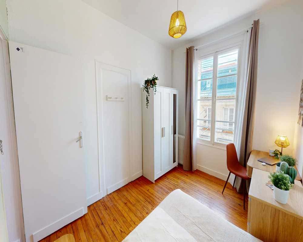 Chambre dans le Rue du Jardin public