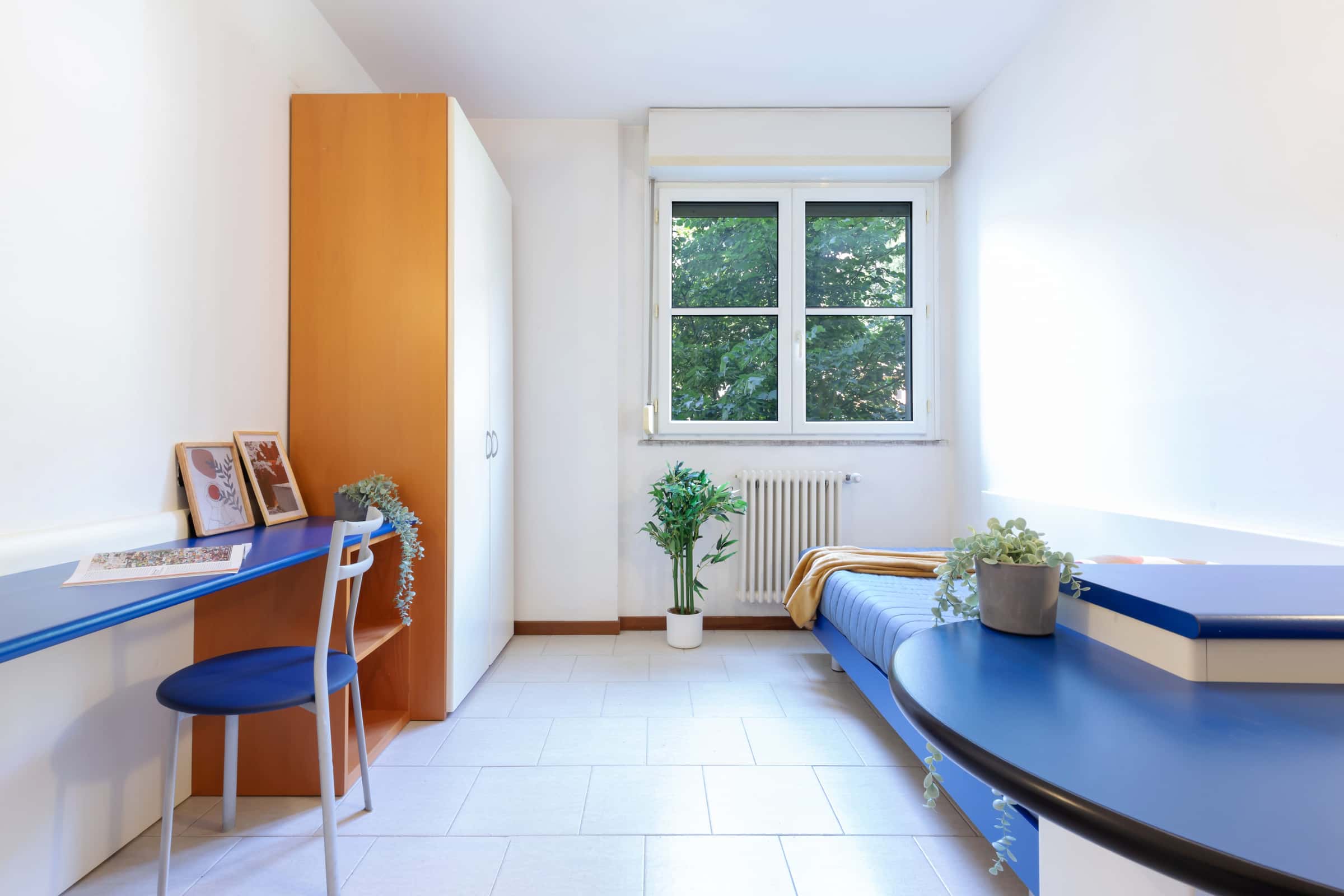 Stanza singola con bagno condiviso
