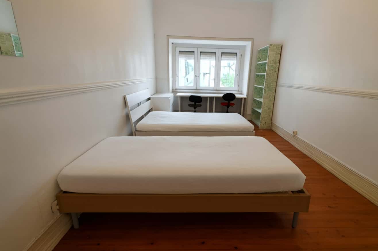Quarto com várias camas em apartamento com 6 quartos - FLAT A - A5