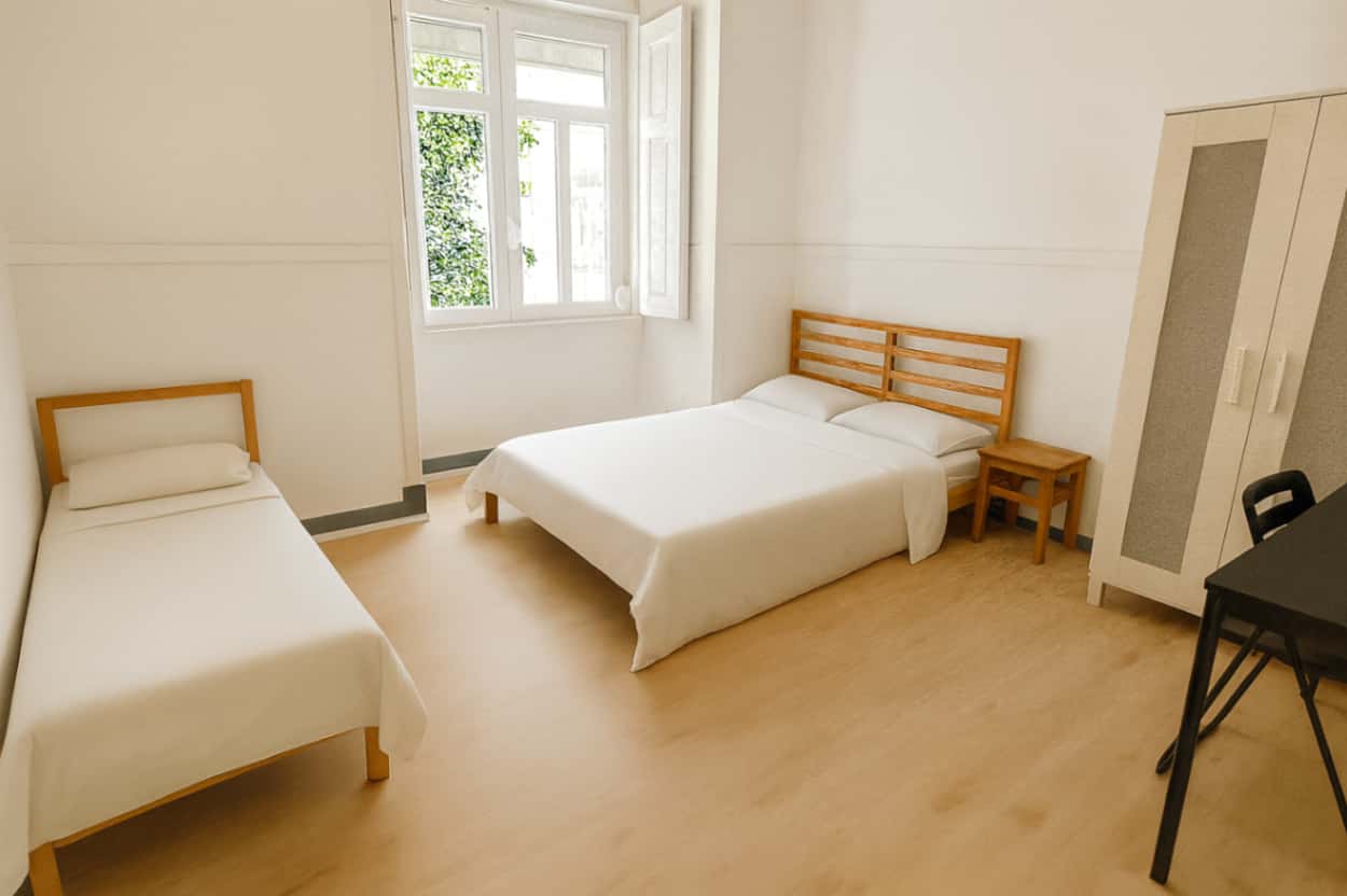 Quarto com várias camas em apartamento com 6 quartos - FLAT C - C4