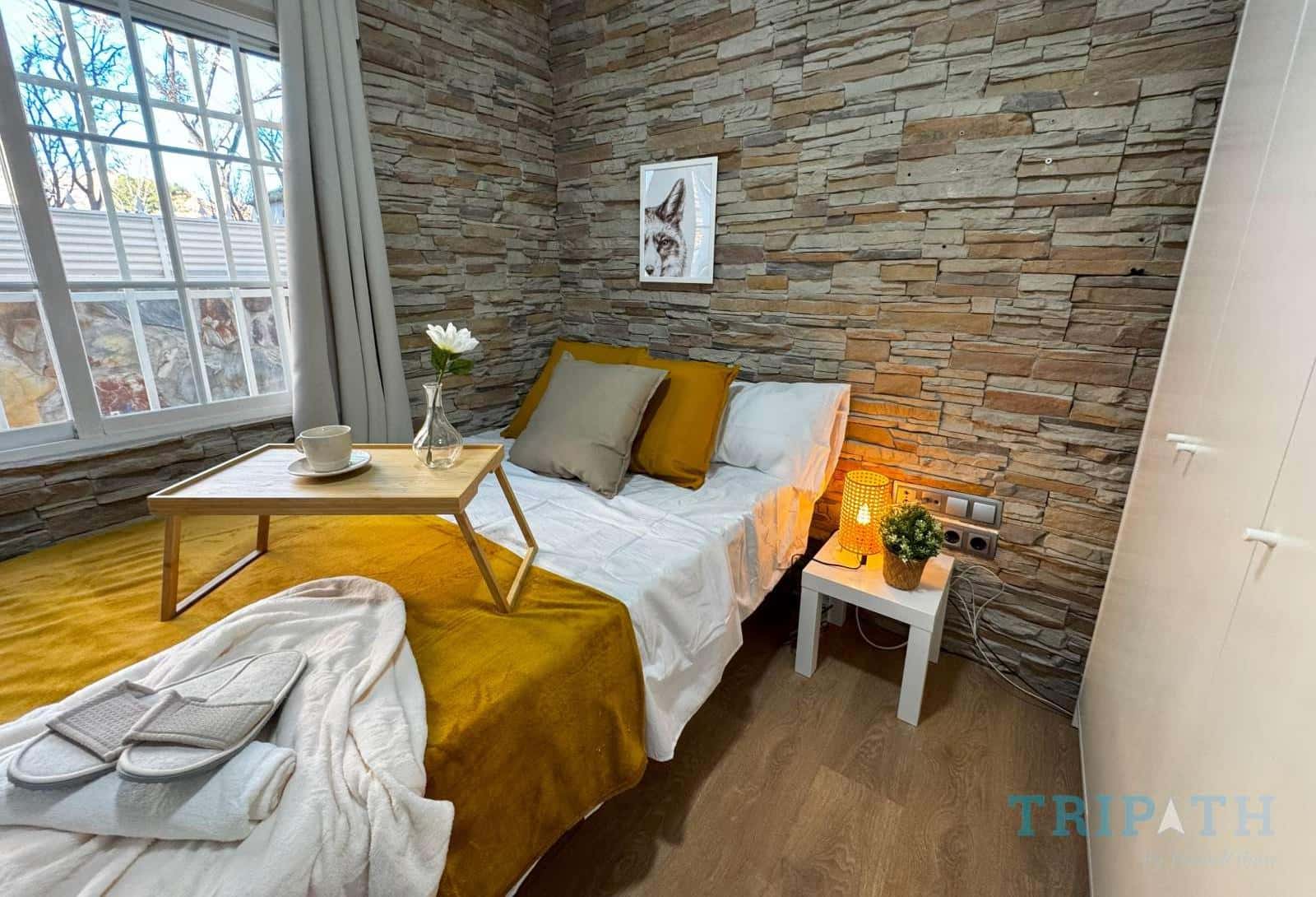 Double bed in Magnificent rooms for rent located in Madrid