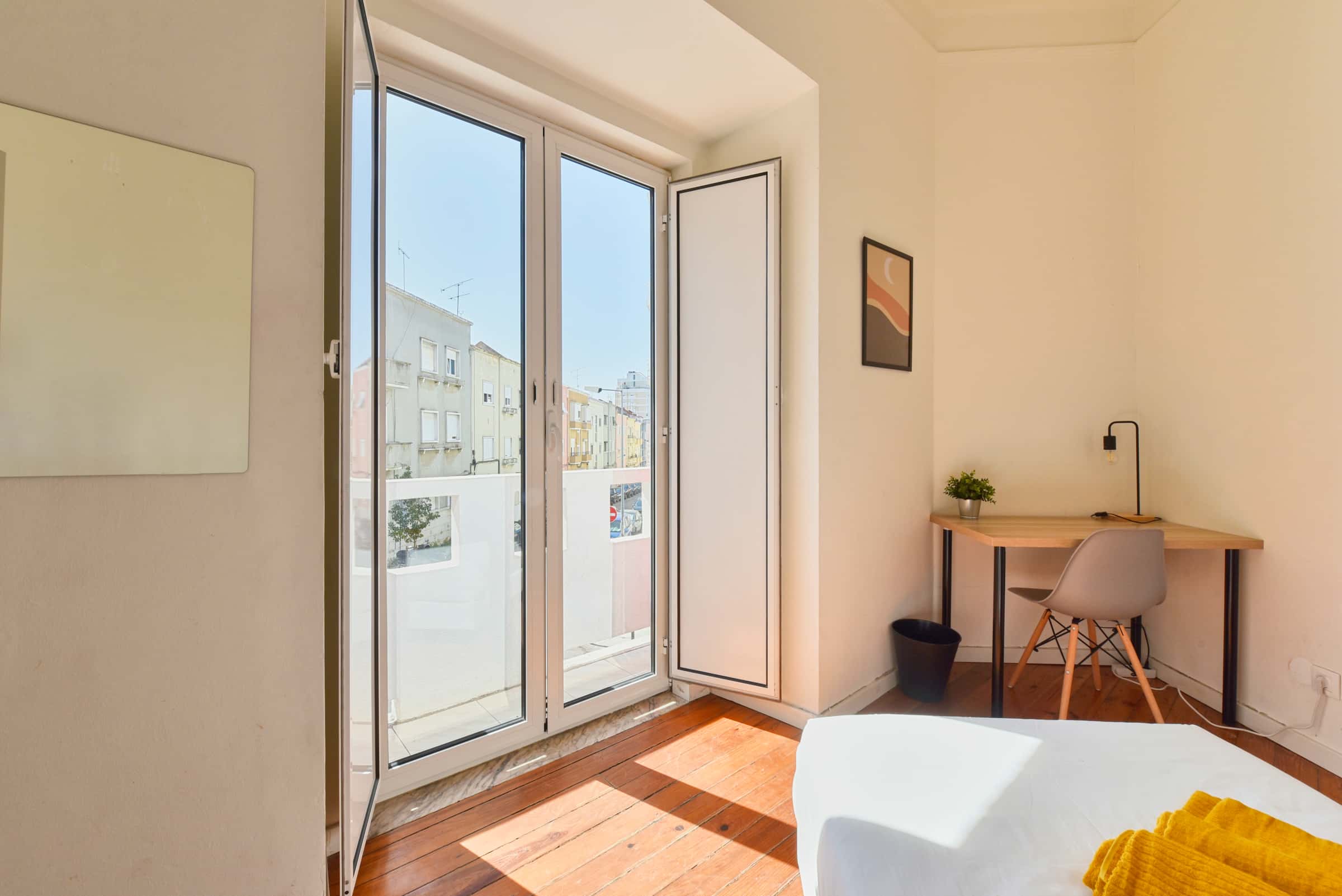 Bedroom in a 7-bedroom apartment in R. David Lopes, Lisbon - Room 203