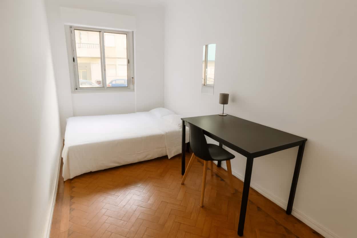 Quarto com cama de casal em apartamento com 3 quartos - FLAT R - R1