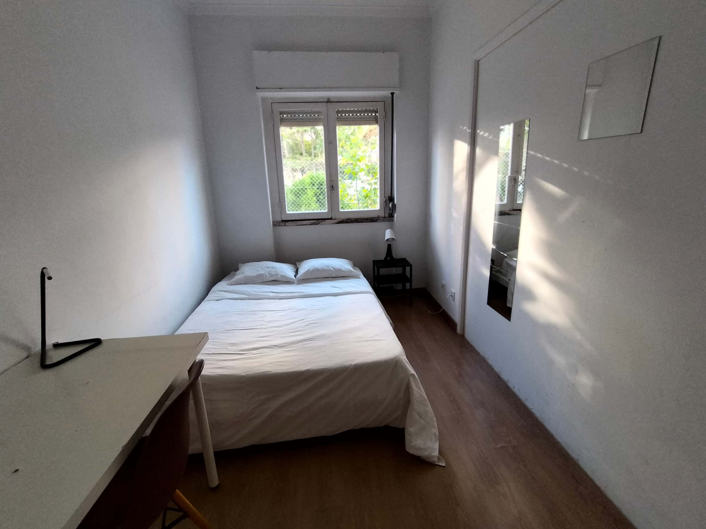 Quarto com cama de casal em apartamento com 3 quartos - FLAT Q - Q1