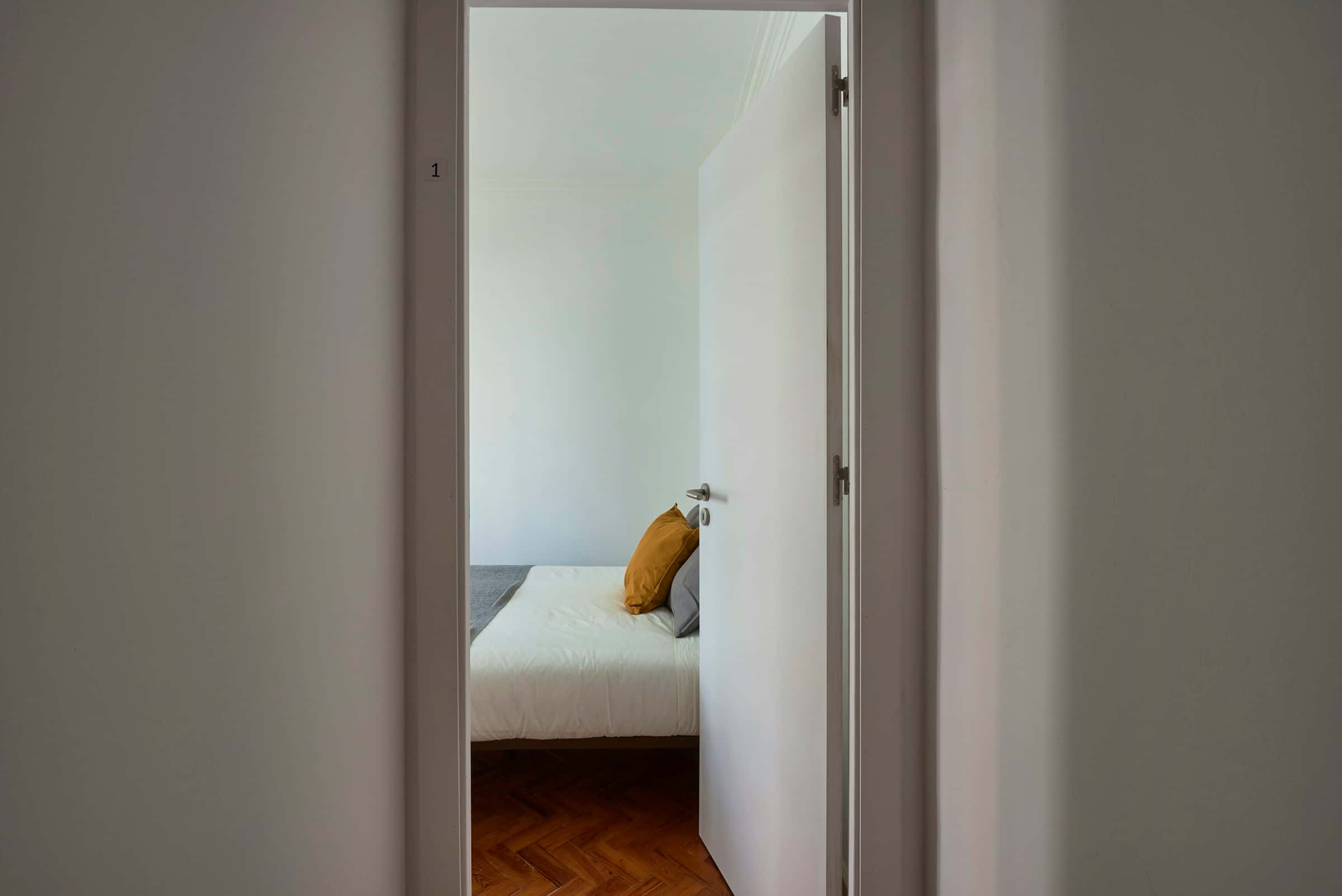 Bedroom in a 7-bedroom apartment in R. Pedro Nunes, Lisbon - Room 1