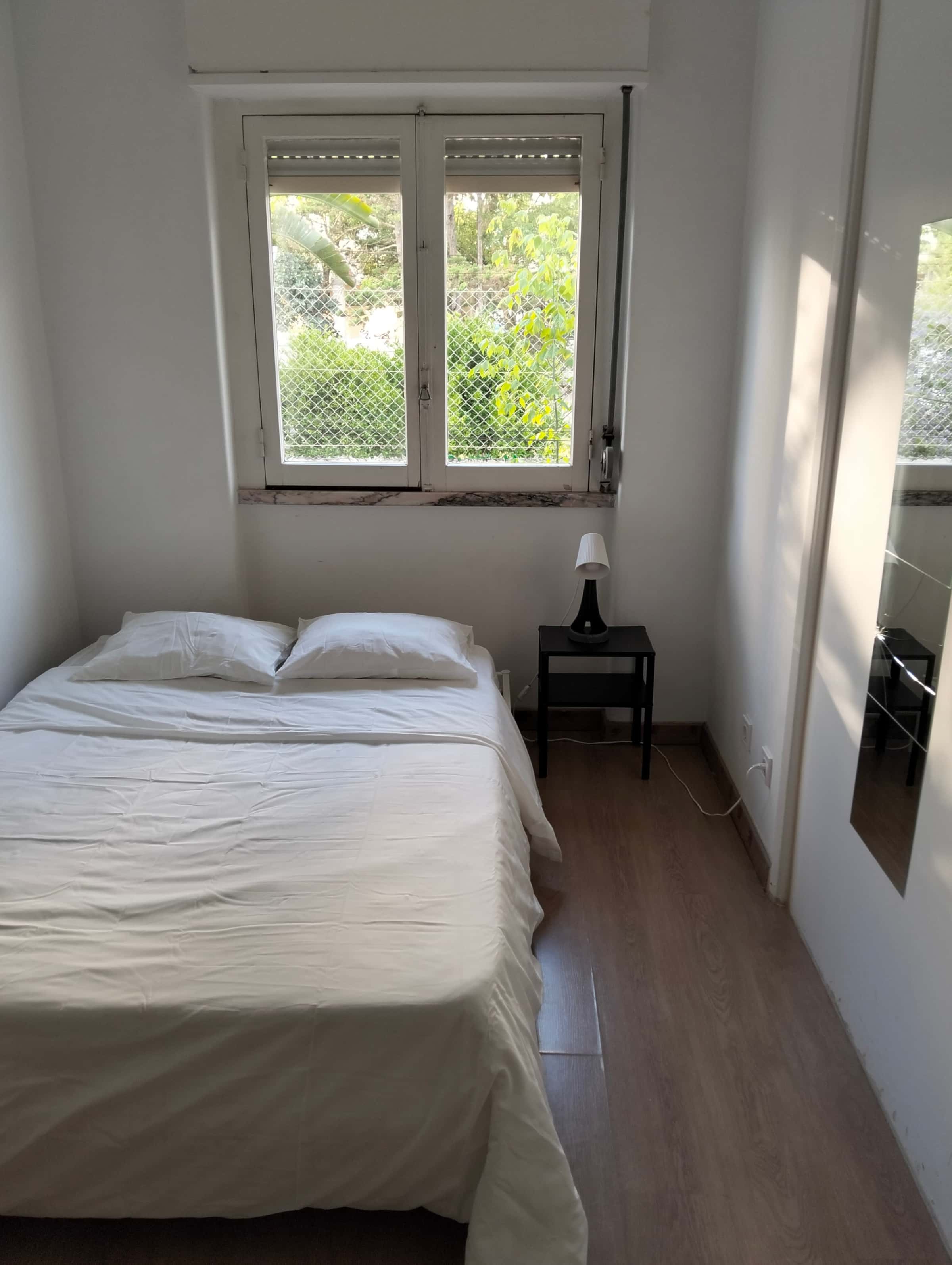 Quarto com cama de casal em apartamento com 3 quartos - FLAT Q - Q1