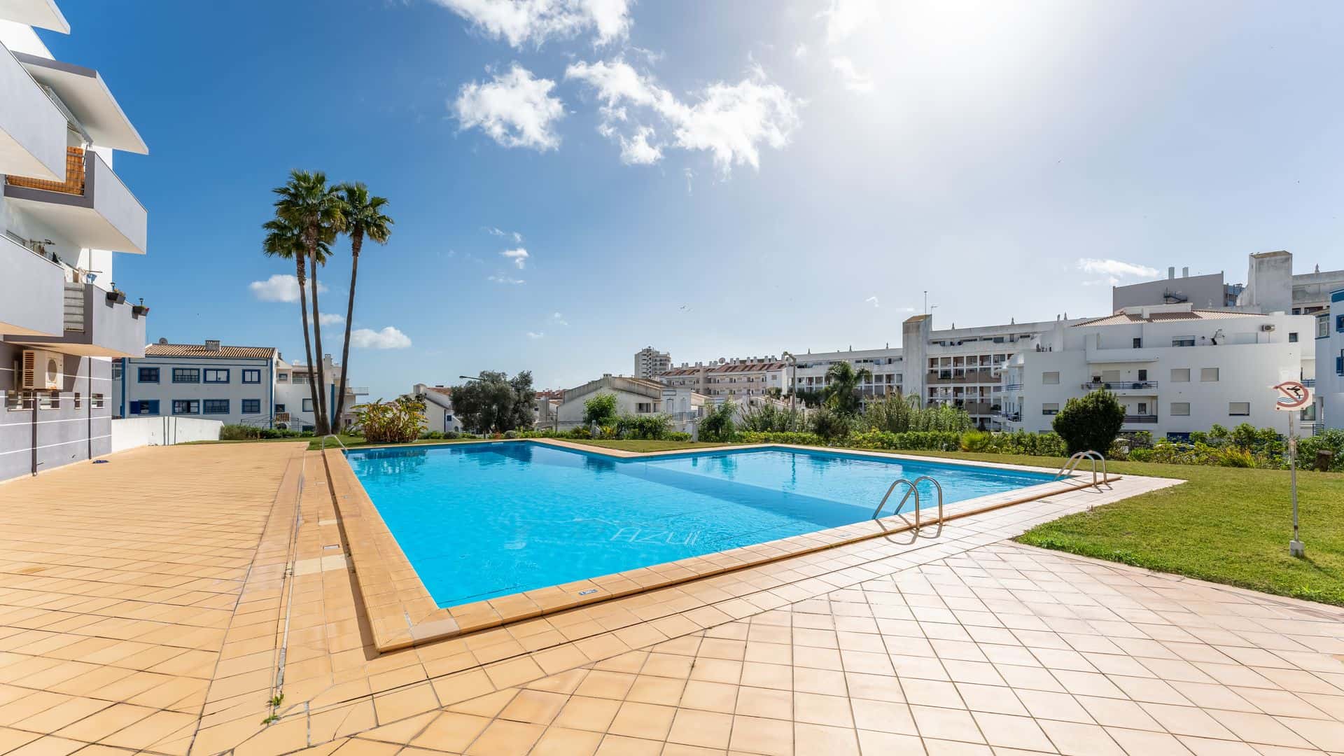 Sunny Retreat w/ Pool and Balcony