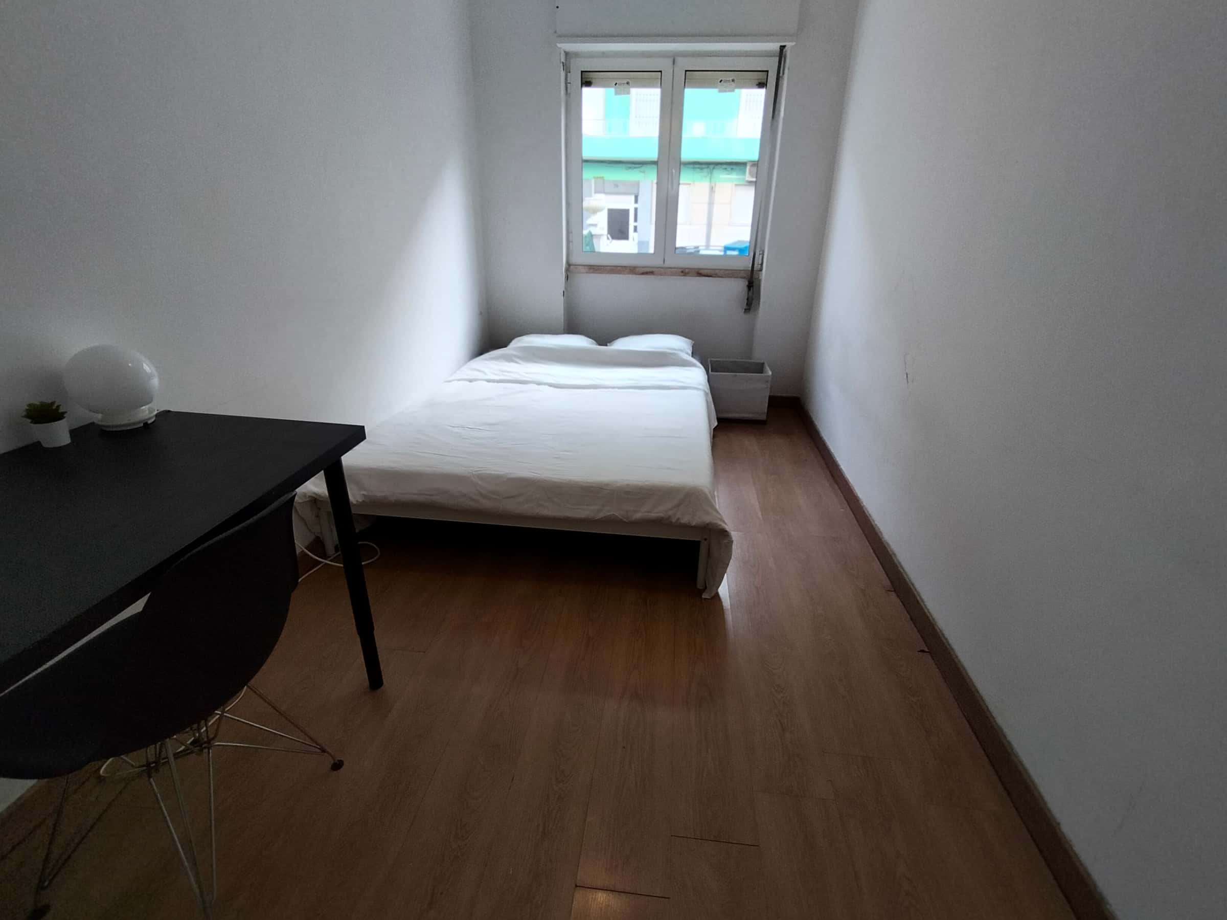 Quarto com cama de casal em apartamento com 3 quartos - FLAT Q - Q3