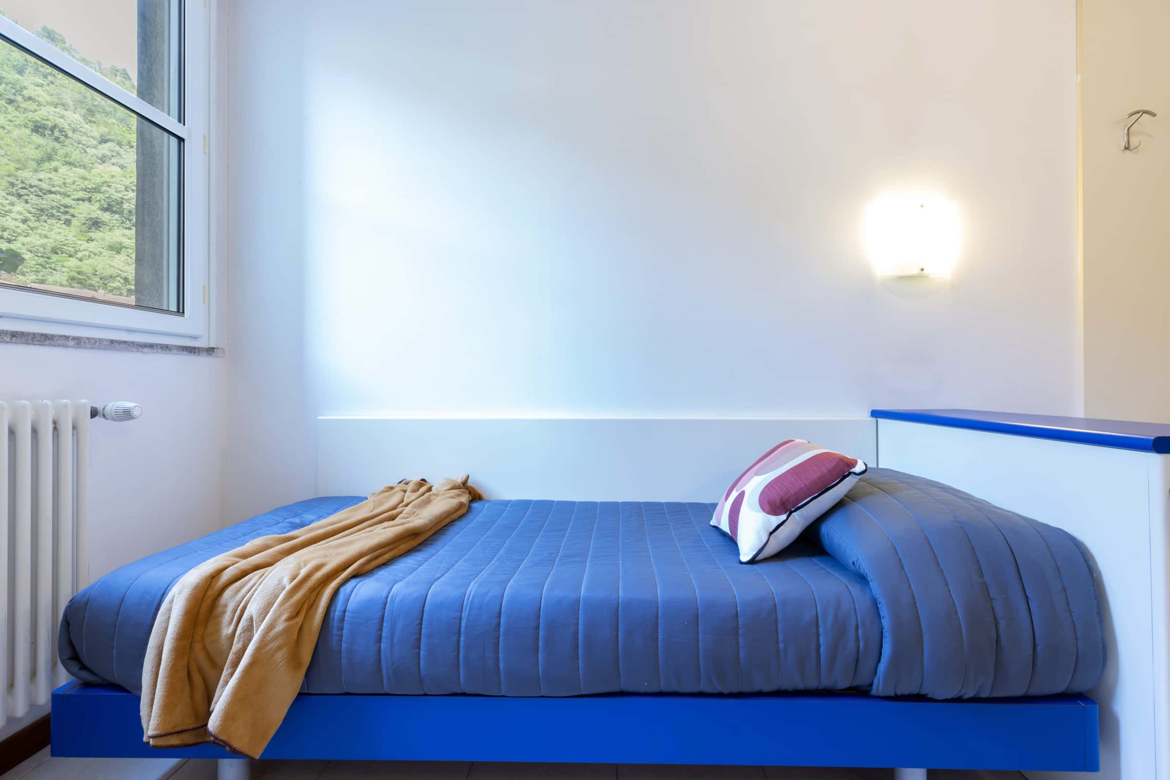 Stanza singola con bagno condiviso